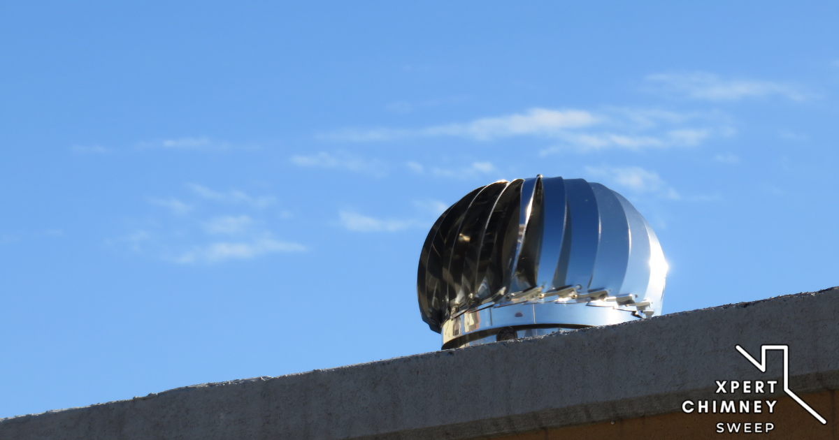 Chimney caps installed on flat roof by Xpert Chimney Sweep
